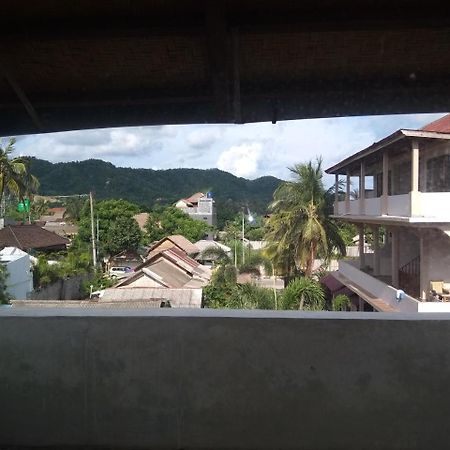 Kuta Bay Homestay Buitenkant foto