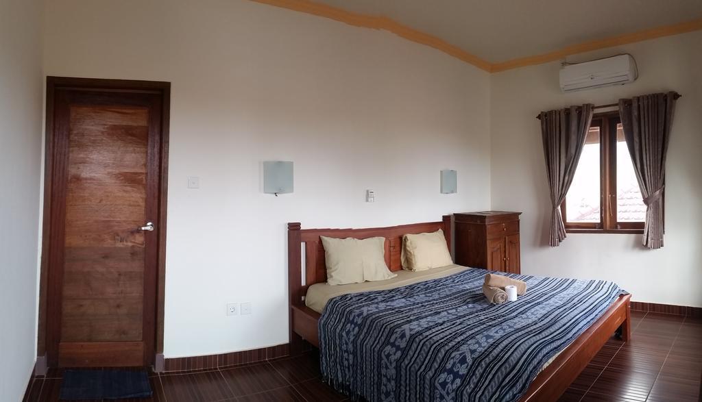 Kuta Bay Homestay Buitenkant foto