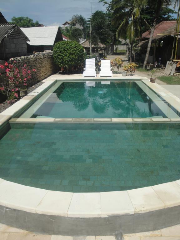 Kuta Bay Homestay Buitenkant foto