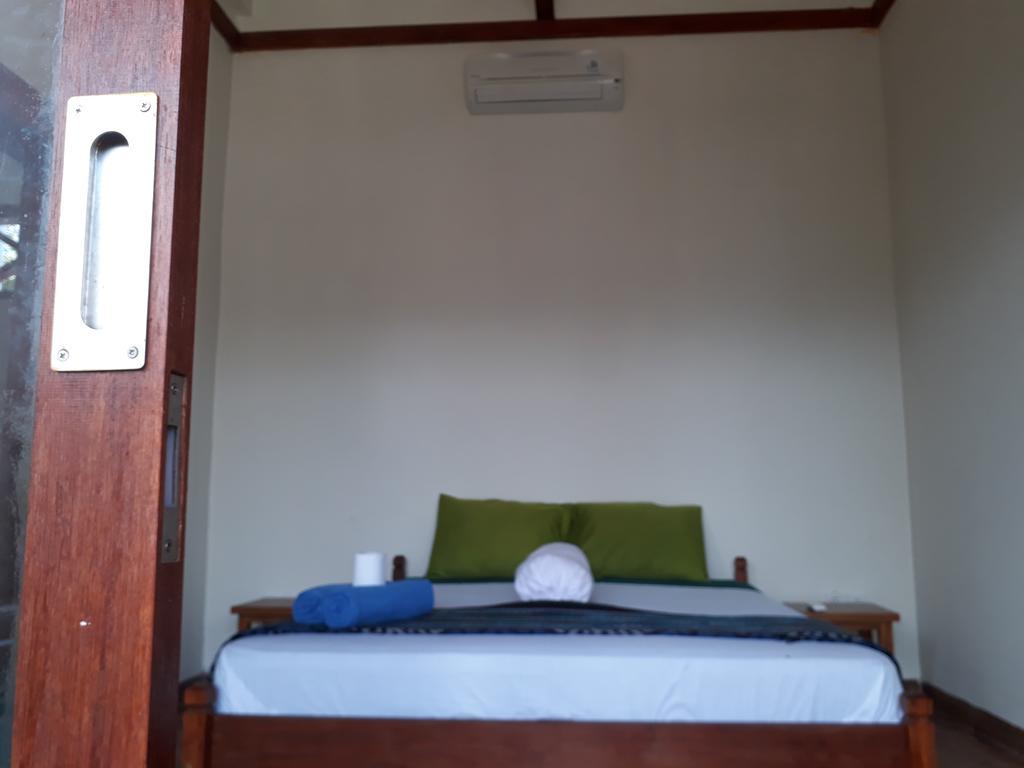 Kuta Bay Homestay Kamer foto