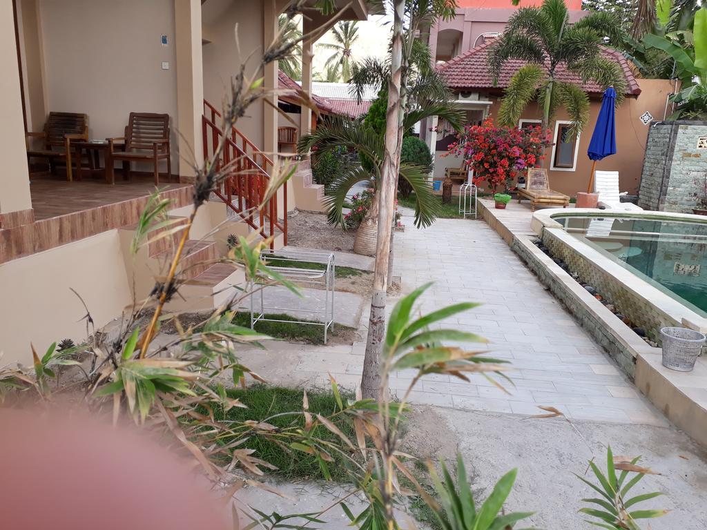 Kuta Bay Homestay Buitenkant foto