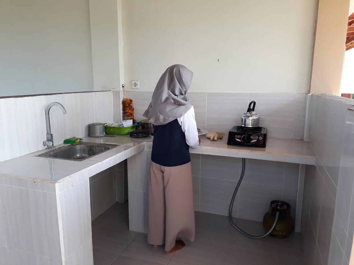Kuta Bay Homestay Buitenkant foto